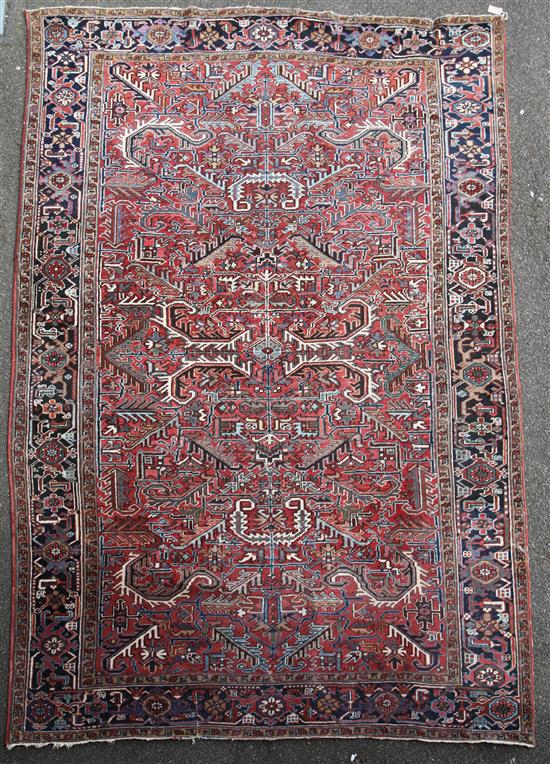 A Persian rug, 11ft 4in by 7ft 11in.